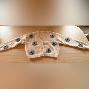 Elegant Cream Cardigan with Blue Floral Details